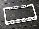 Ain't Caught Sh* Fishing Club Humor Joke White License Plate Frame