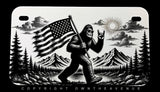 Bigfoot Mountains Forest USA American Flag Humor Motorcycle License Plate