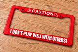 Caution I Don't Play Well With Others Funny Joke Prank Red License Plate Frame - OwnTheAvenue
