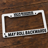 Warning Manual Transmission May Roll Backwards White License Plate Frame